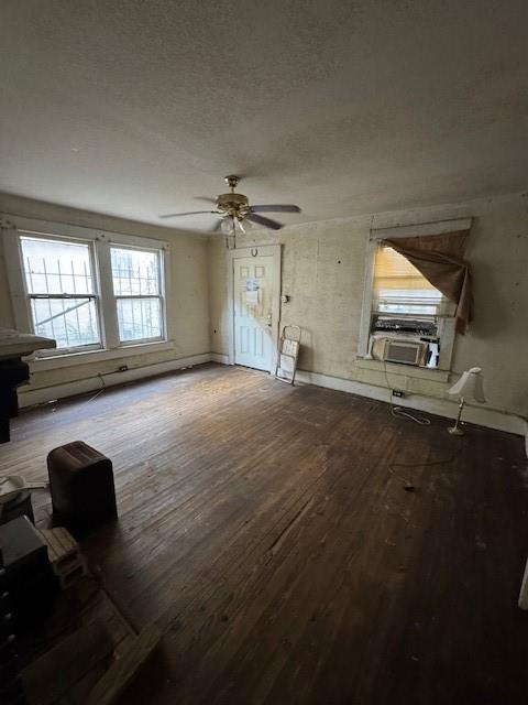 3900 Colonial Avenue Dallas, TX 75215 - Photo 2 of 15 an empty room with windows and ceiling fan