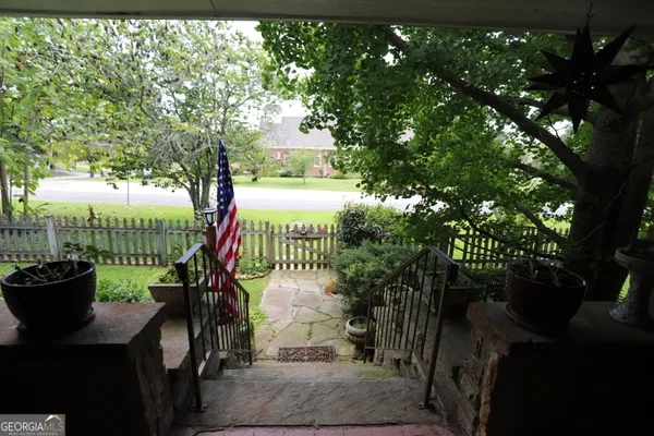 a view of a bench in a backyard