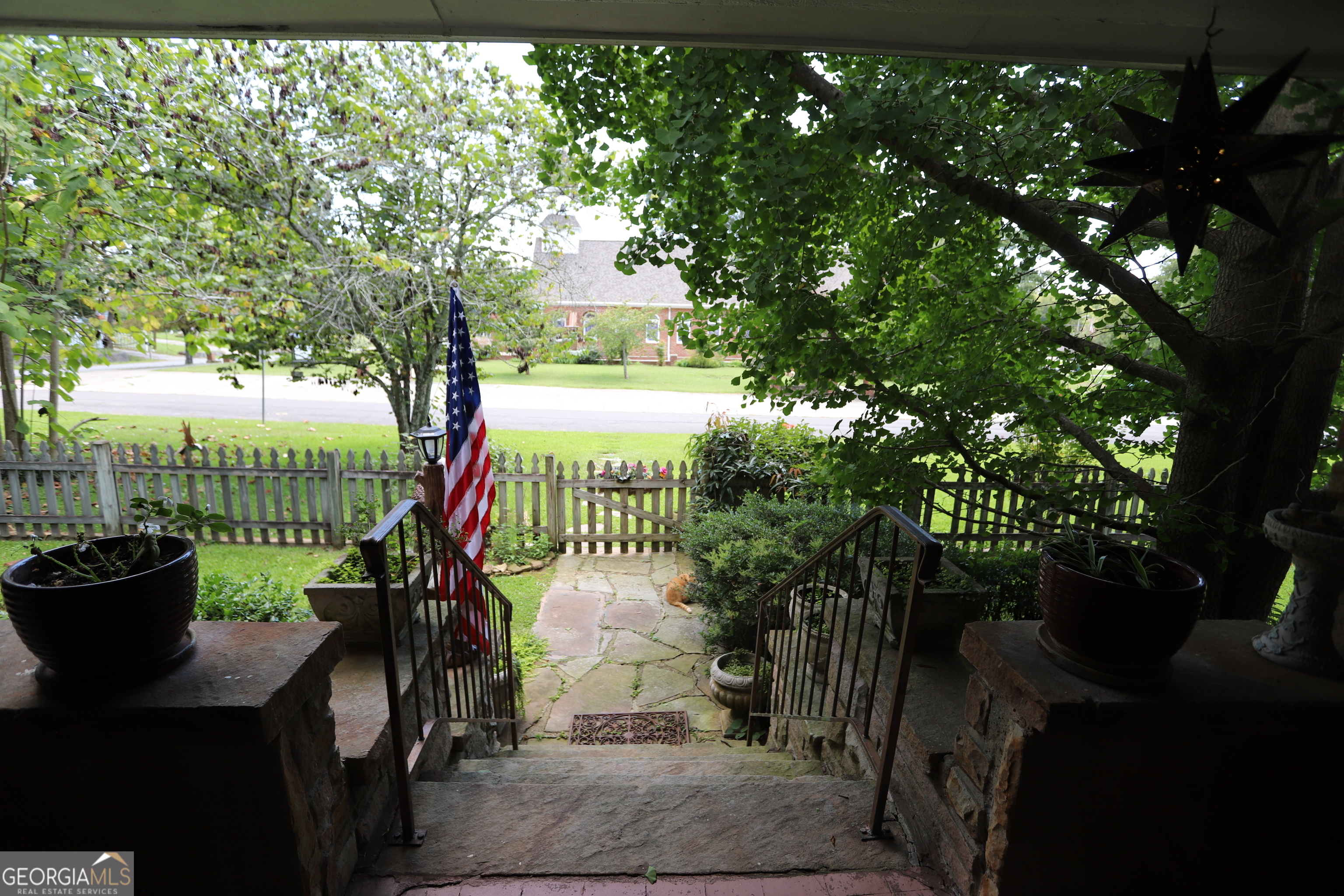 360 Edison Street Menlo, GA 30731 - Photo 16 of 64 a view of a potted plants and large tree