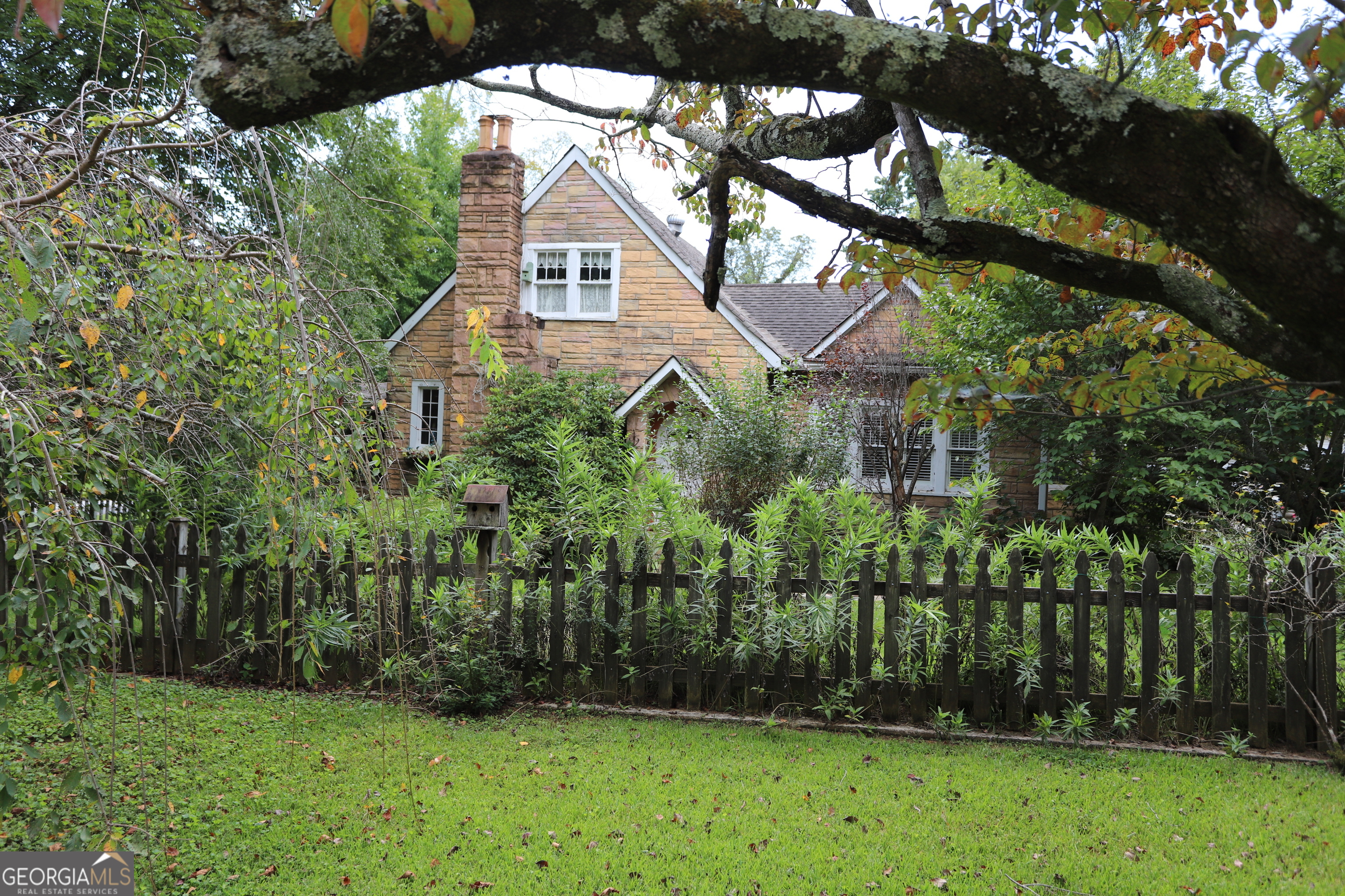 360 Edison Street Menlo, GA 30731 - Photo 24 of 64 a view of a house with a yard and plants