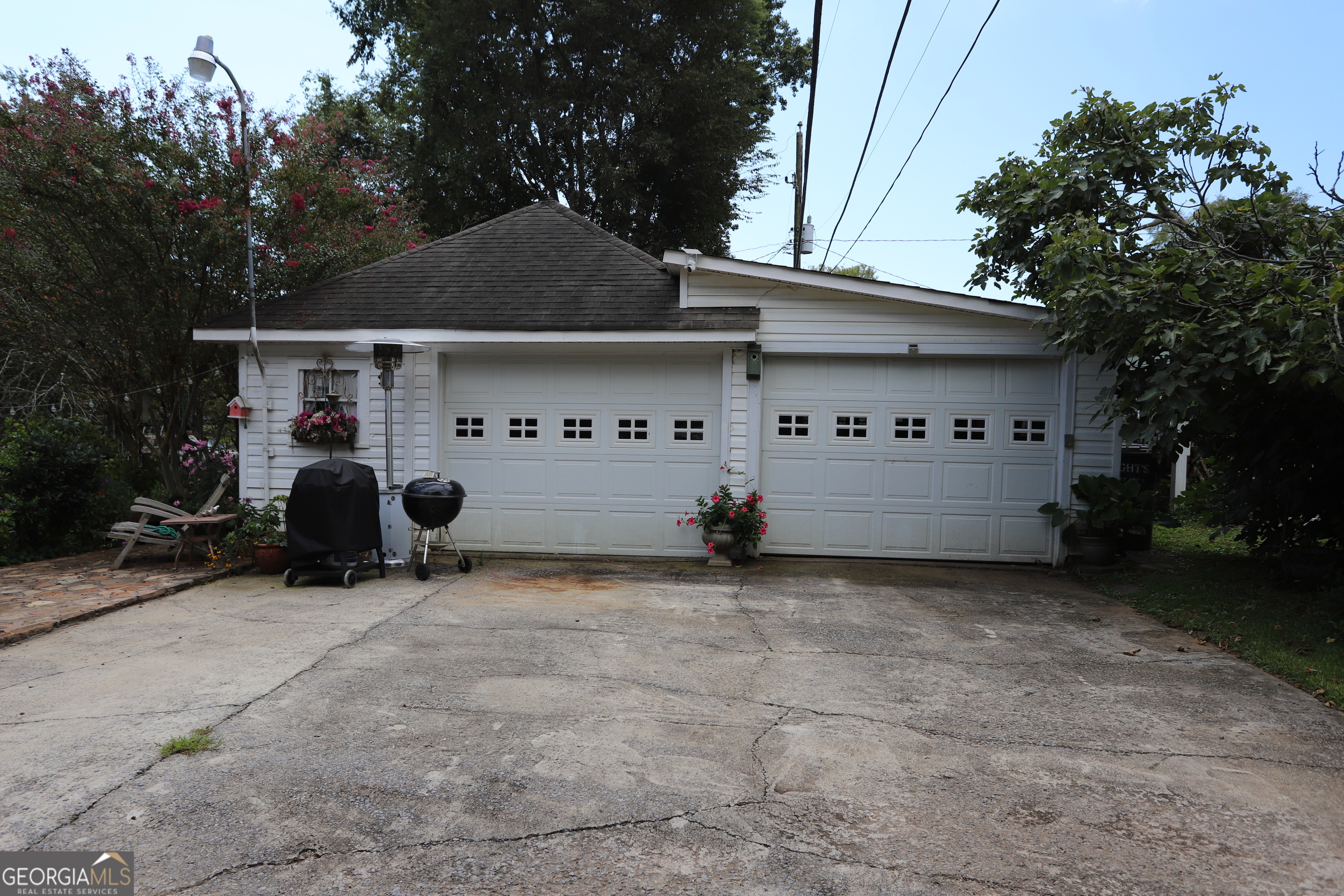 360 Edison Street Menlo, GA 30731 - Photo 26 of 64 a view of a house with a yard and a garage
