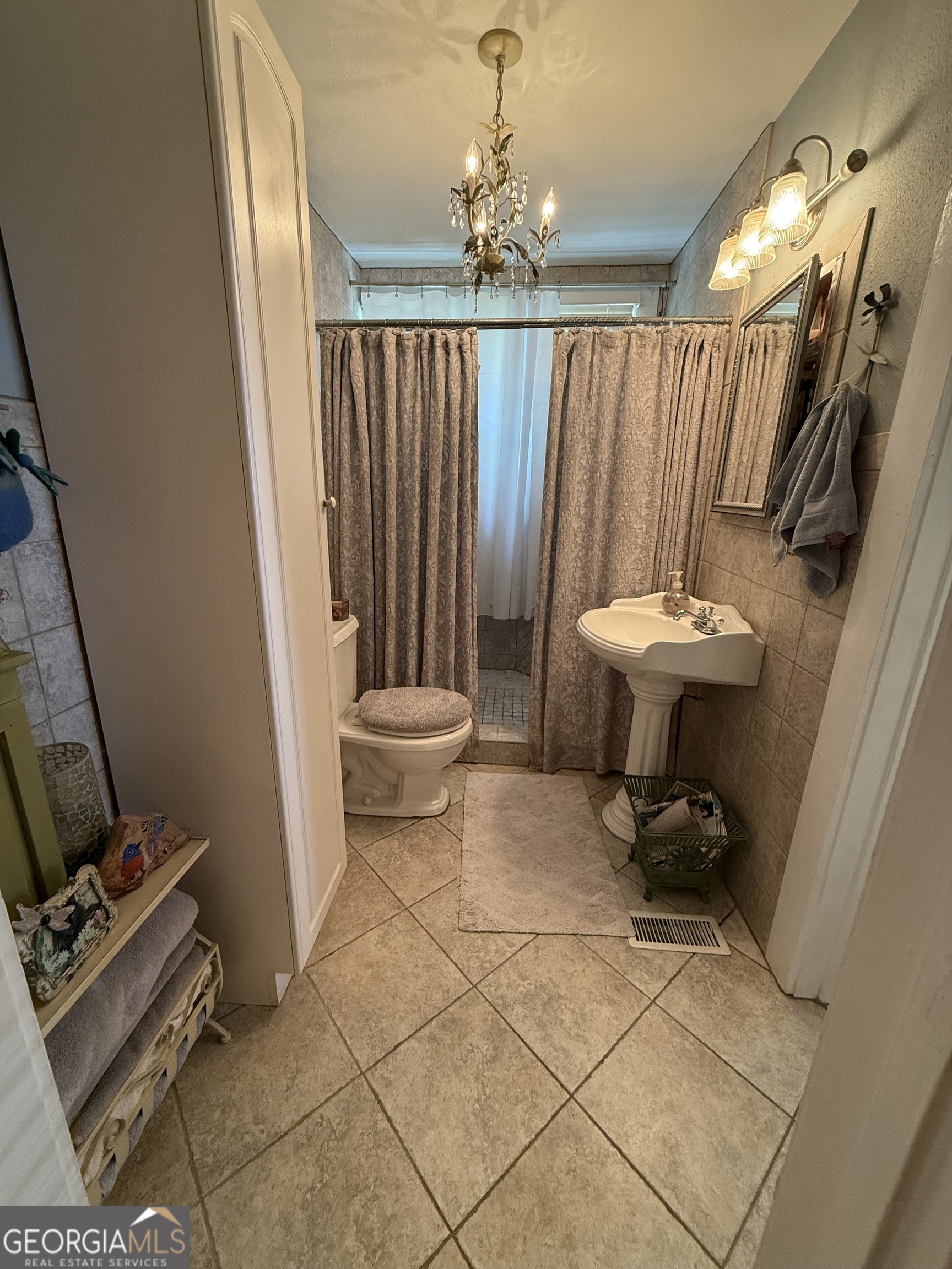 360 Edison Street Menlo, GA 30731 - Photo 33 of 64 a bathroom with a sink toilet and shower