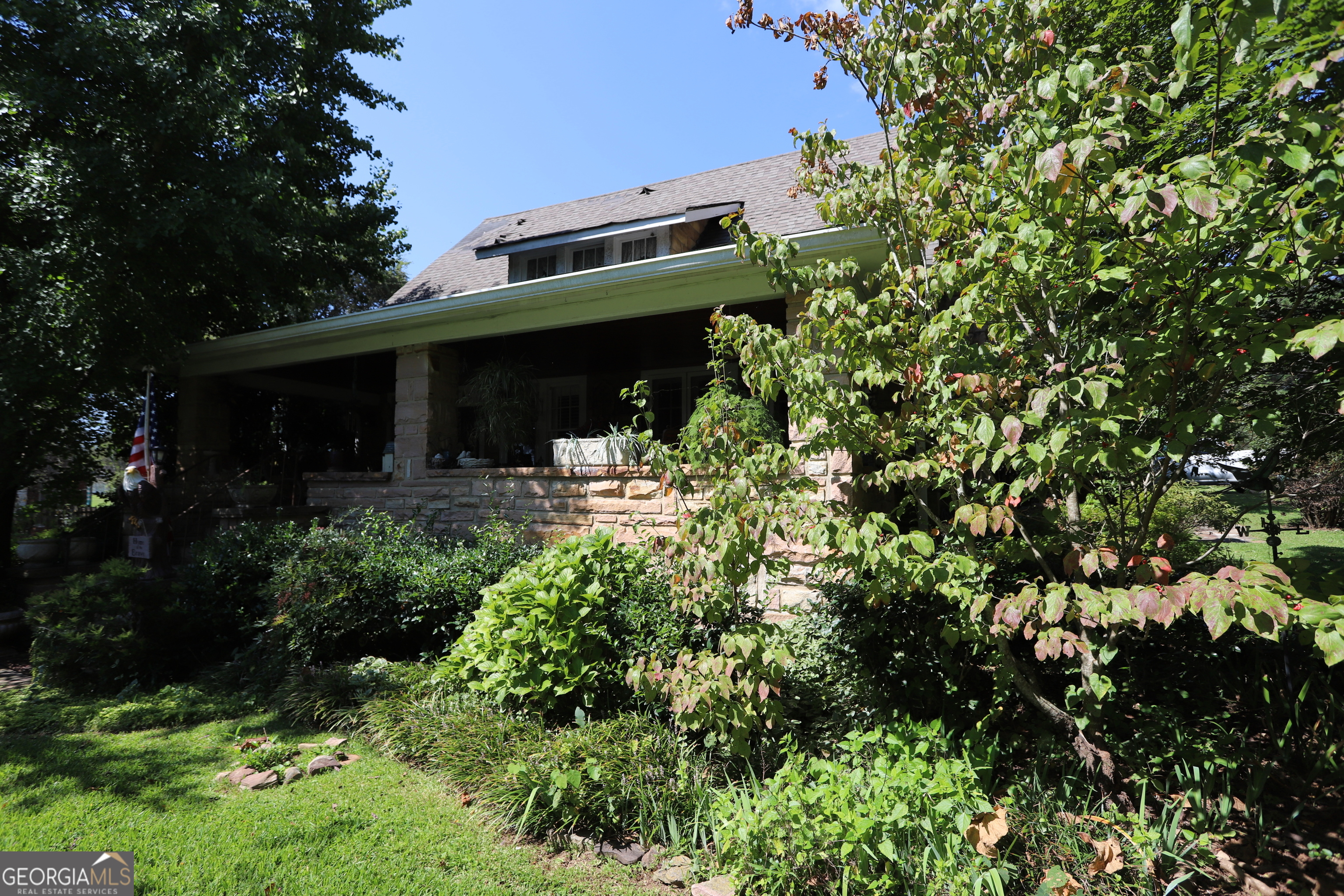 360 Edison Street Menlo, GA 30731 - Photo 5 of 64 a view of a garden with plants
