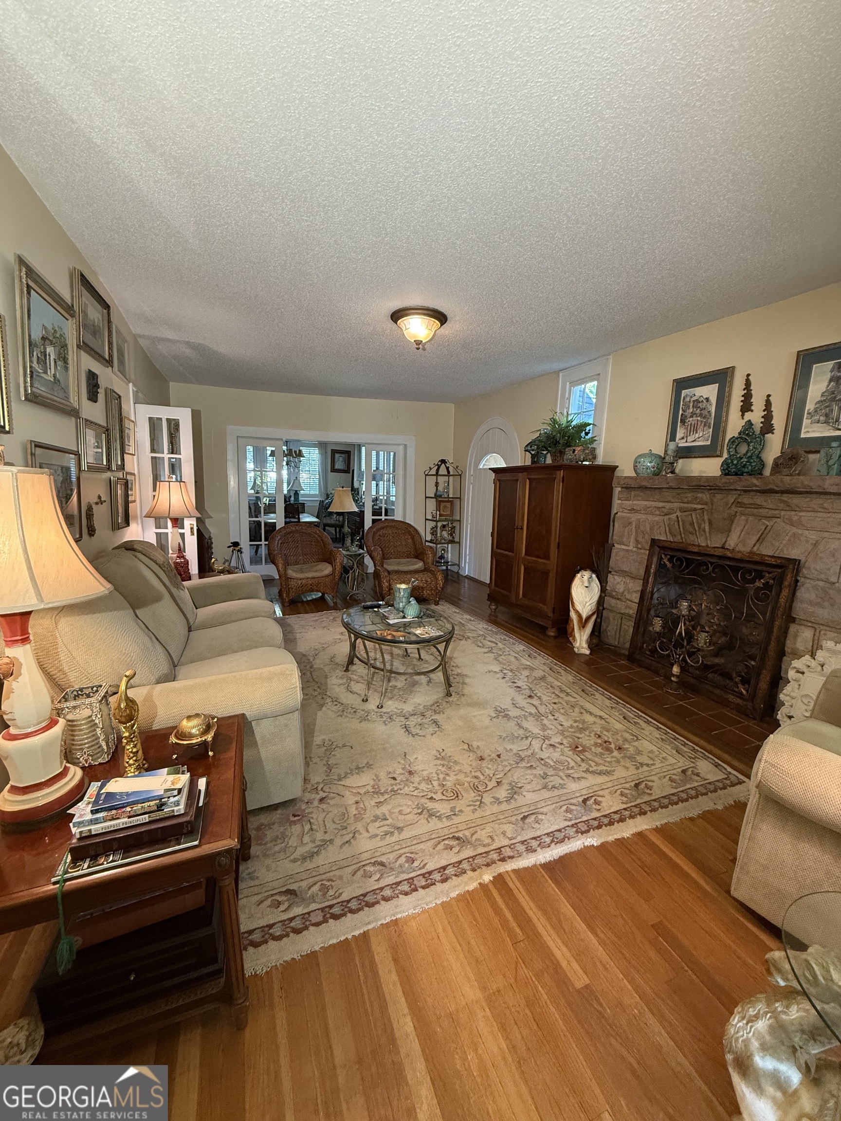 360 Edison Street Menlo, GA 30731 - Photo 51 of 64 a living room with furniture and a fireplace