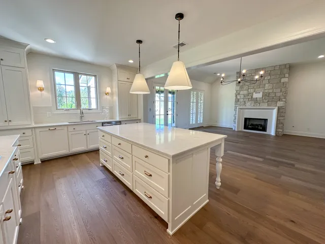 a view of a room with a big yard