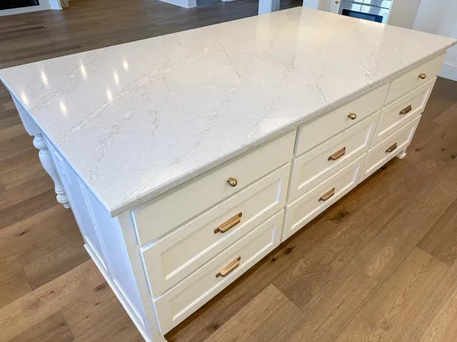 a bathroom with a window and a shower