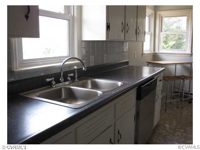 467 Crymes Orchard Road Keysville, VA 23947 - Photo 3 of 13 a kitchen with a sink and a window