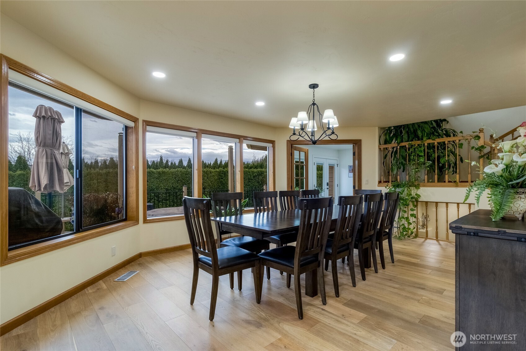 1343 Highland Road Walla Walla, WA 99362 - Photo 13 of 40 a view of a dining room with furniture window and wooden floor