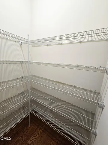 a view of a room with racks on the wall