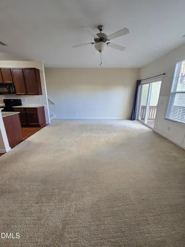 a view of a livingroom with a fireplace