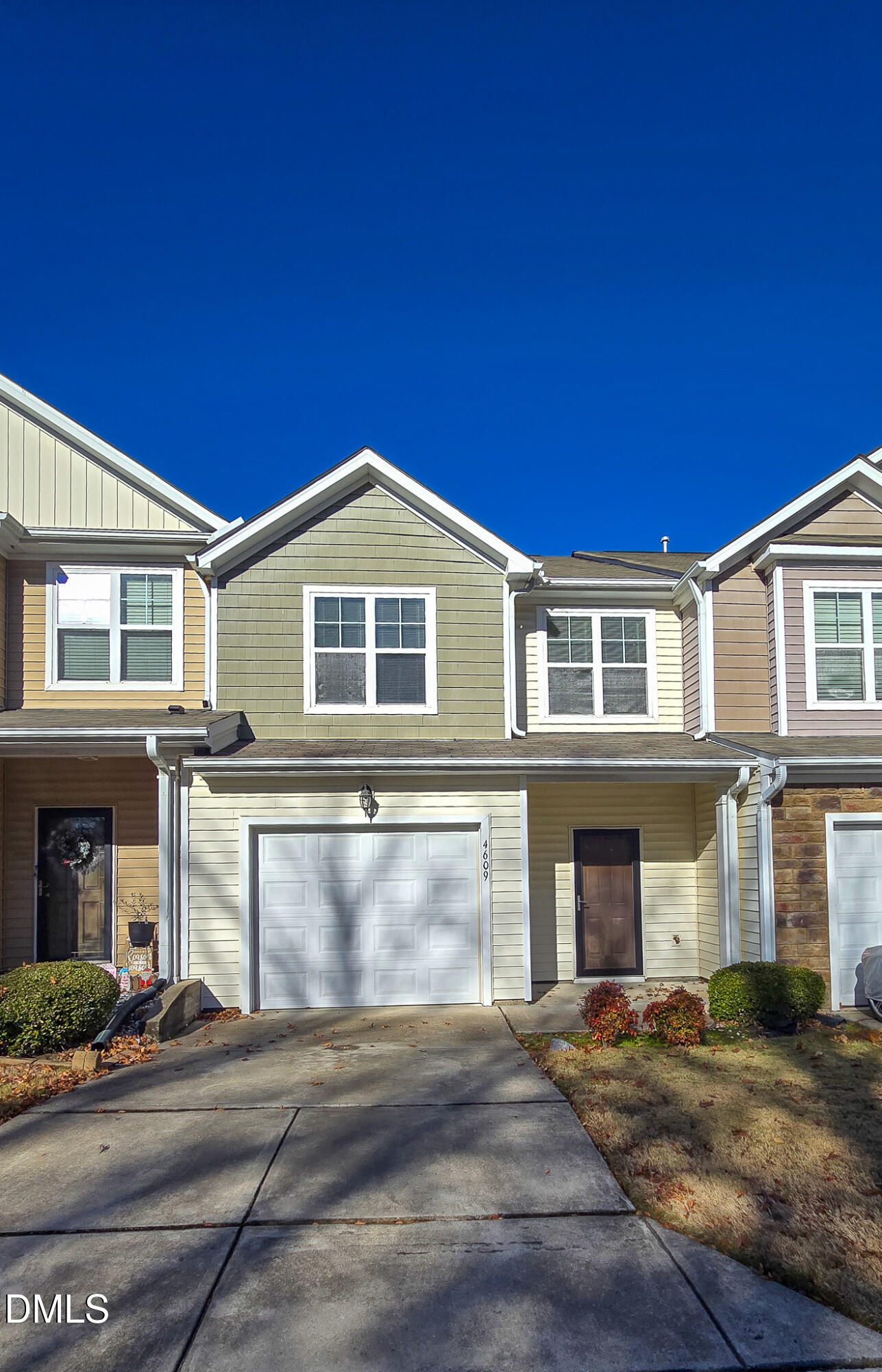 4609 Pat Reed Road Raleigh, NC 27616 - Photo 2 of 42 a front view of a house with yard