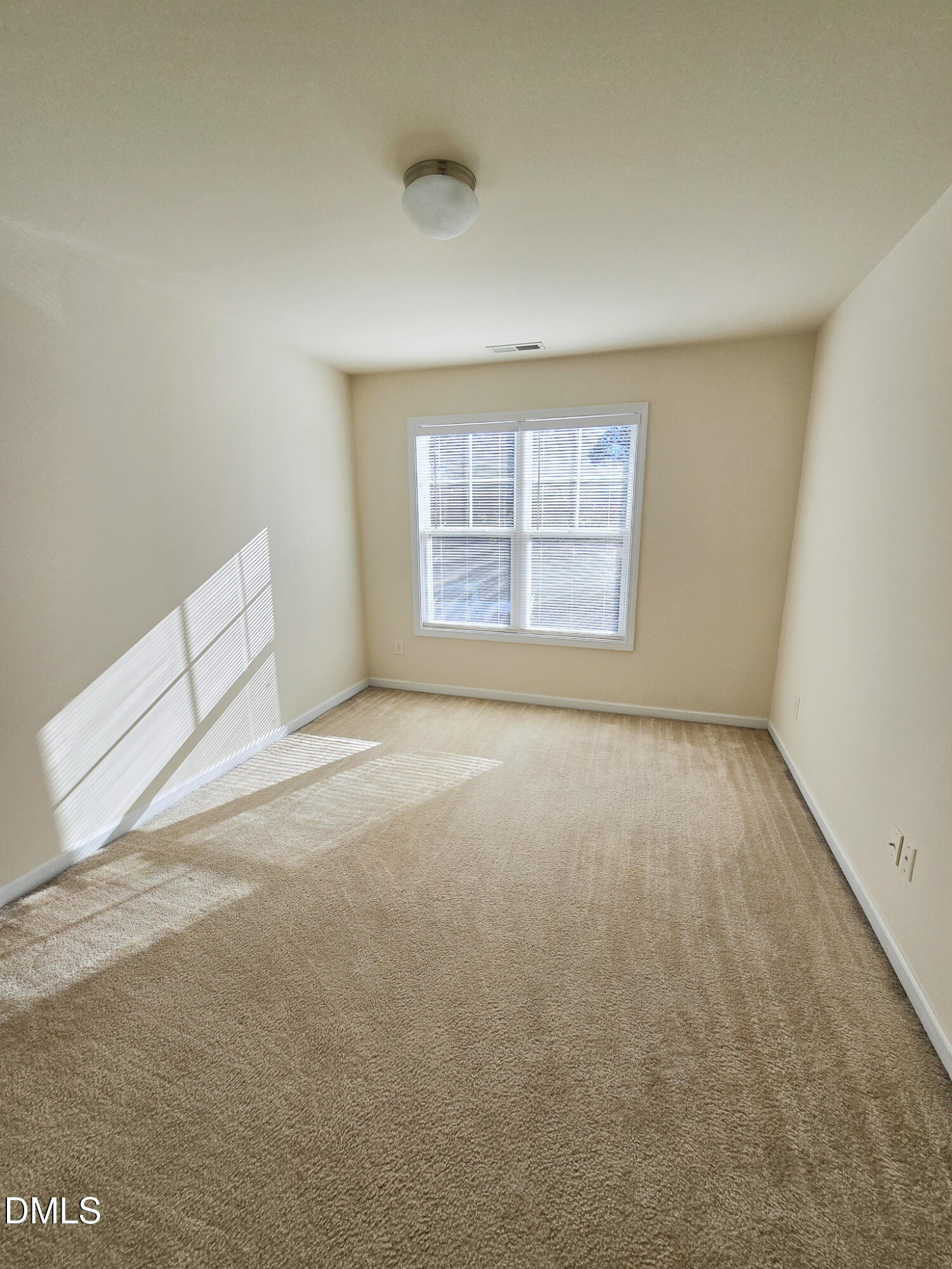 4609 Pat Reed Road Raleigh, NC 27616 - Photo 27 of 42 an empty room with a window
