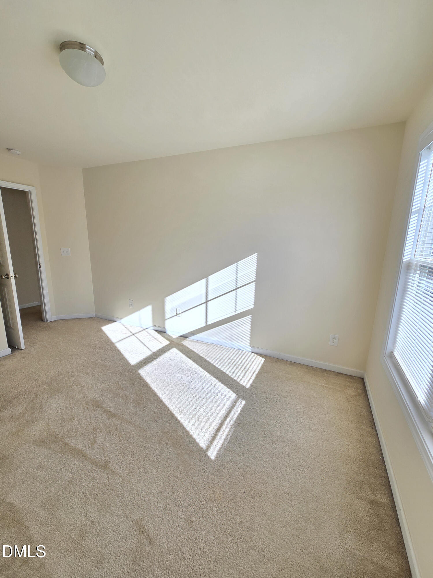 4609 Pat Reed Road Raleigh, NC 27616 - Photo 33 of 42 an empty room with windows