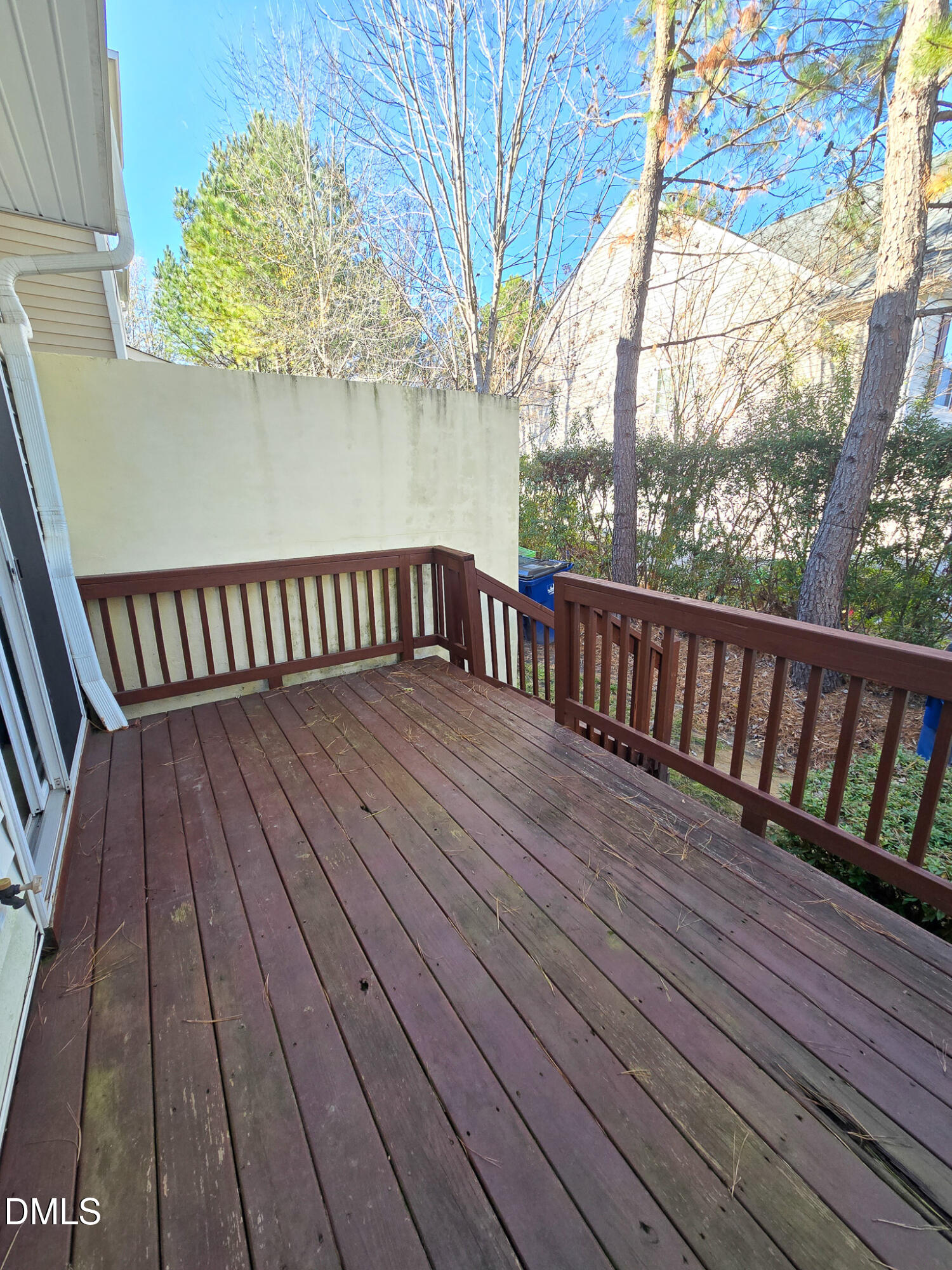 4609 Pat Reed Road Raleigh, NC 27616 - Photo 42 of 42 a balcony with wooden floor and fence