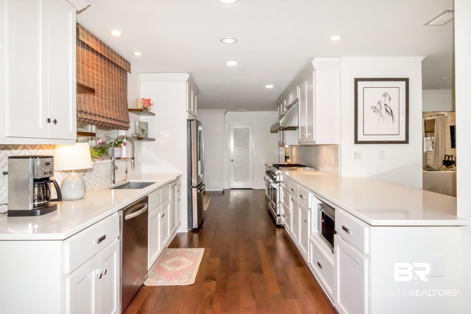 154 Fenwick Road Mobile, AL 36608 - Photo 16 of 48 Kitchen featuring white cabinets, stainless steel appliances, dark wood-style floors, and recessed lighting