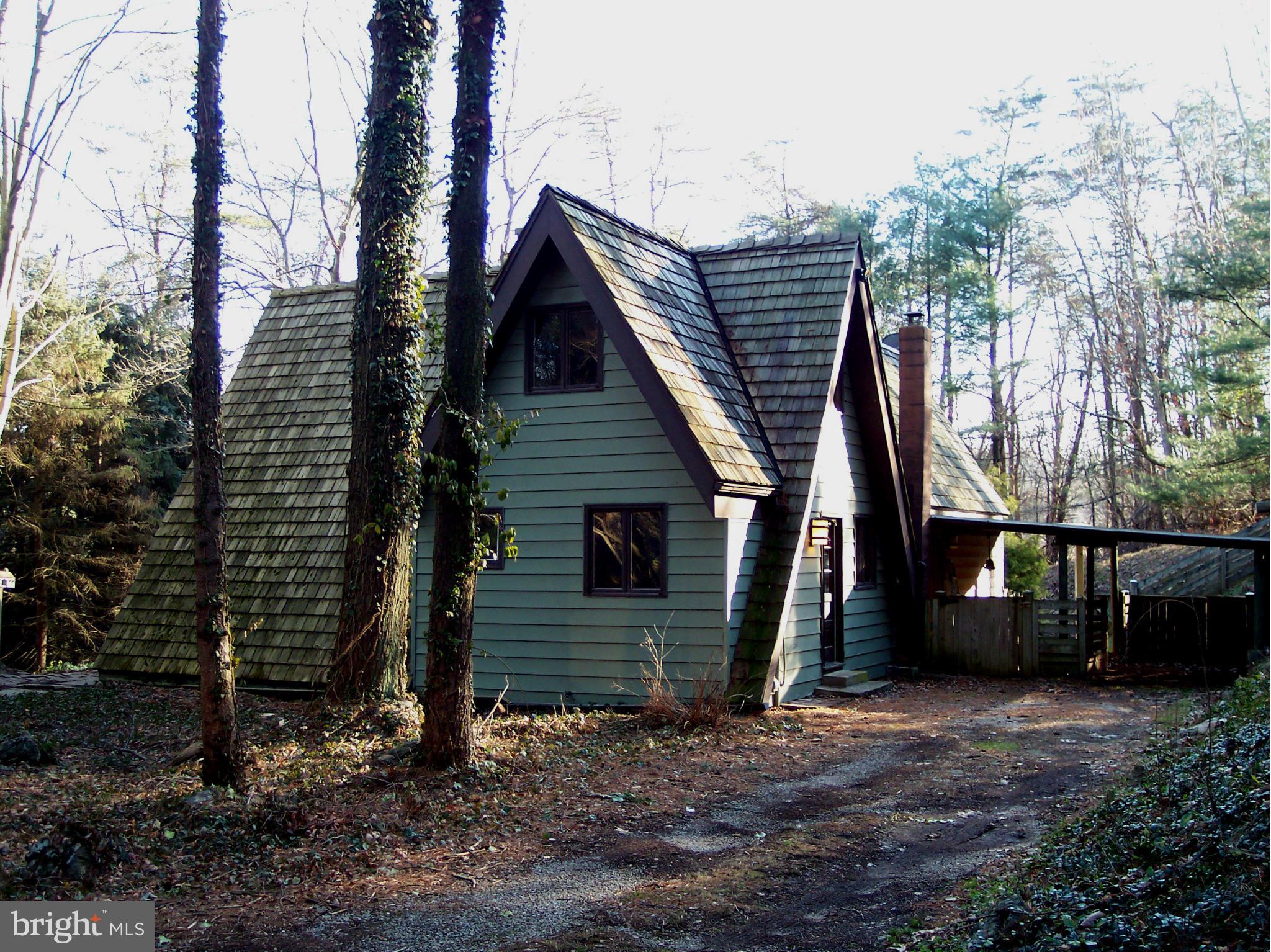 3843 Rinehart Road Westminster, MD 21158 - Photo 1 of 28 Cozy A-Frame nestled in the woods