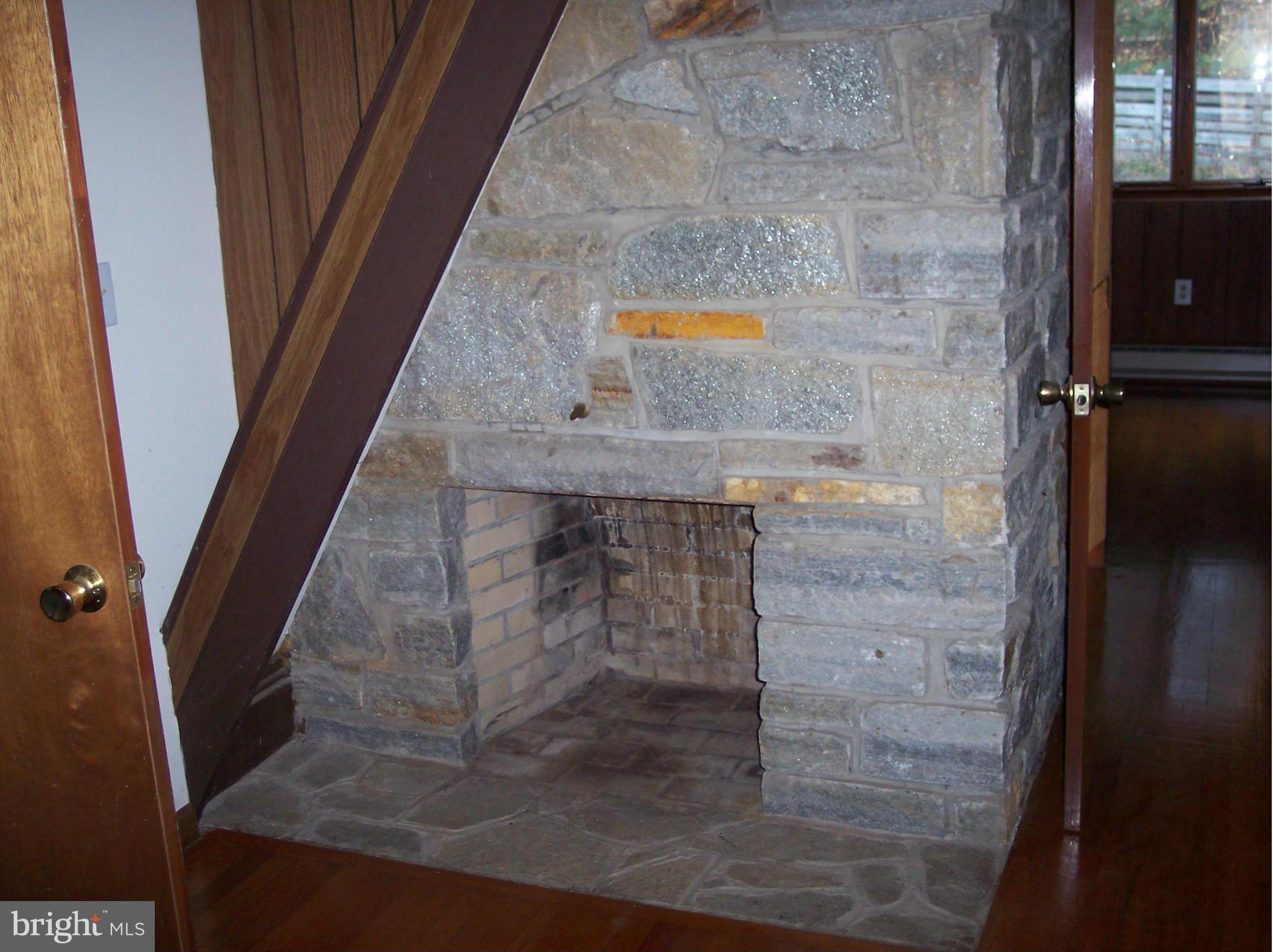 3843 Rinehart Road Westminster, MD 21158 - Photo 20 of 28 Beautiful stone fireplace on the 2nd floor