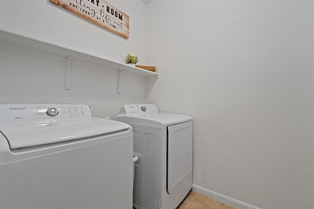 10308 Hatton Lane Austin, TX 78754 - Photo 13 of 25 Dedicated laundry room with washer and dryer, conveniently located on the main level