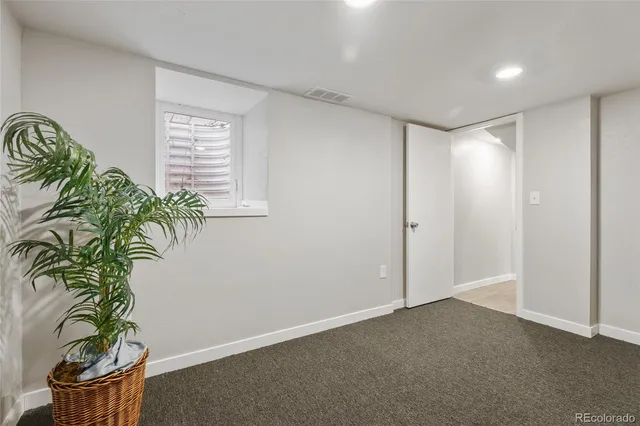 a very nice looking room with a potted plant