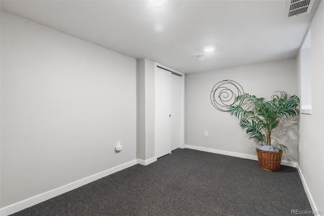 a view of a room with potted plant