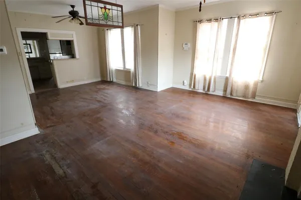 an empty room with windows