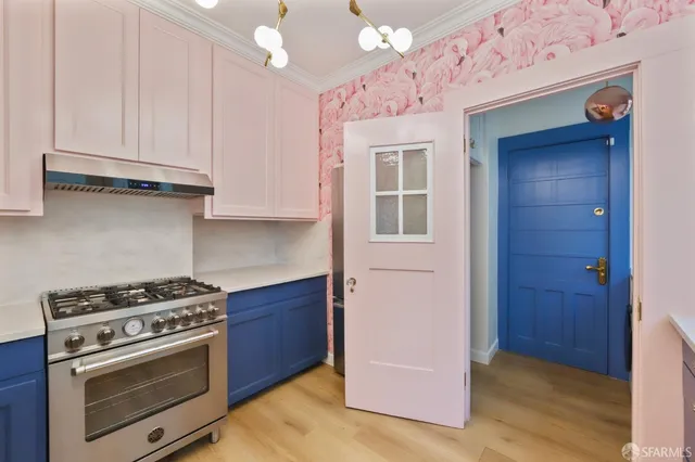a kitchen with a stove and a microwave