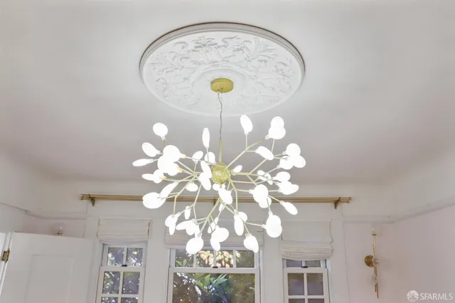 a vase of flowers sitting on a table