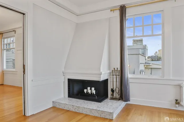 a view of a city from a balcony with city view