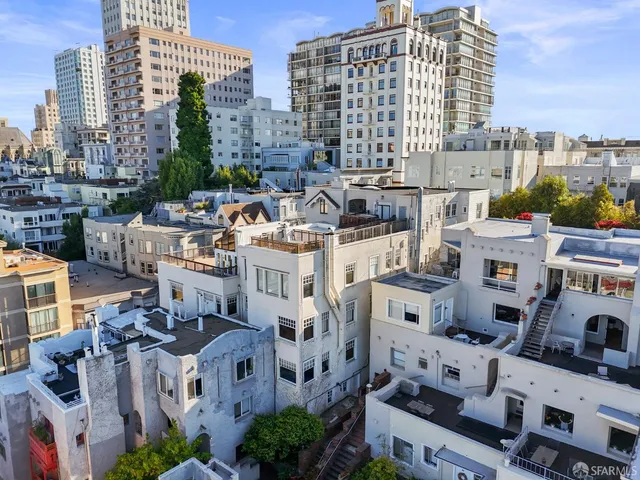 a view of a car parked in front of a building