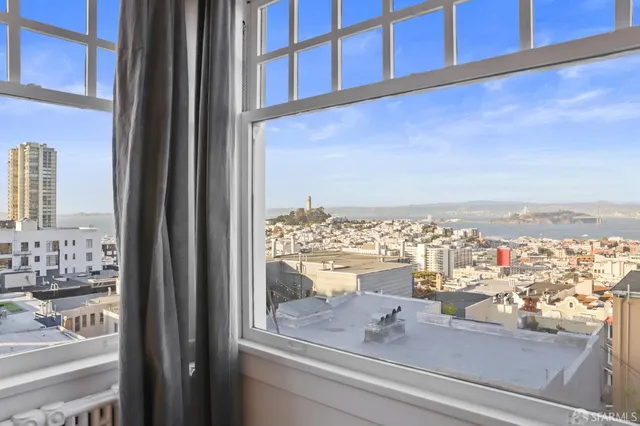 a view of a balcony with city view