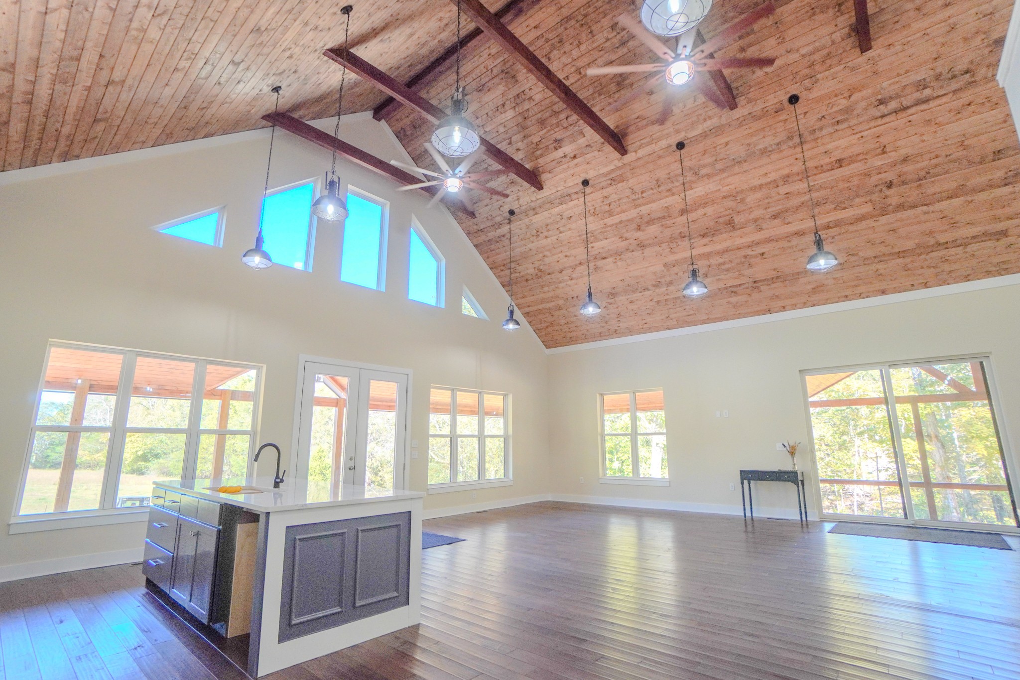 5109 Union Camp Road Lafayette, TN 37083 - Photo 16 of 36 a view of an empty room with wooden floor and a window