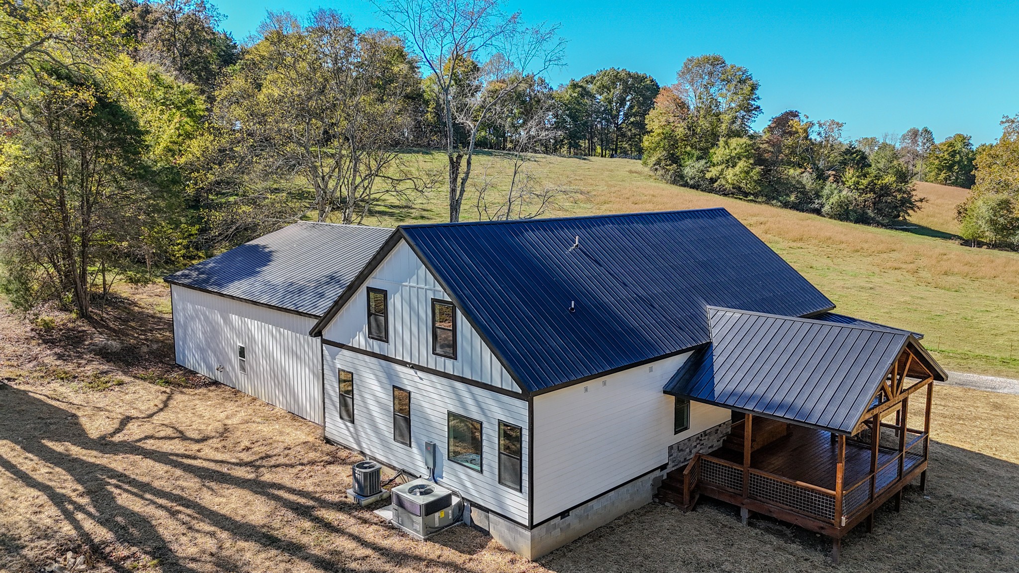 5109 Union Camp Road Lafayette, TN 37083 - Photo 23 of 36 an aerial view of a house with backyard and sitting area