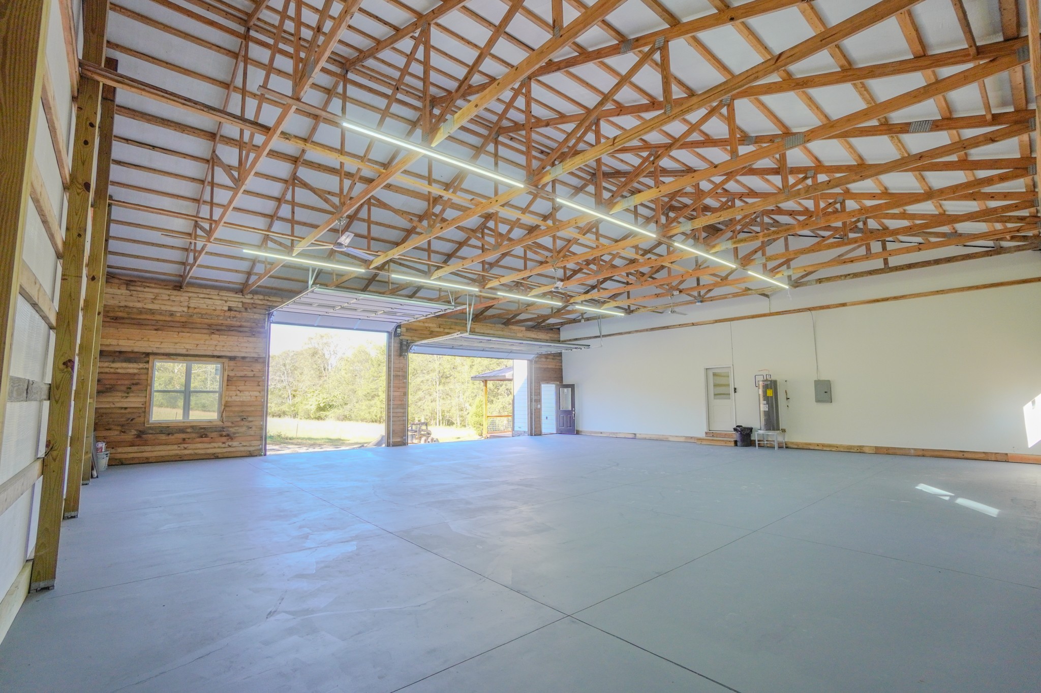 5109 Union Camp Road Lafayette, TN 37083 - Photo 25 of 36 a view of an empty room with a fireplace and a window