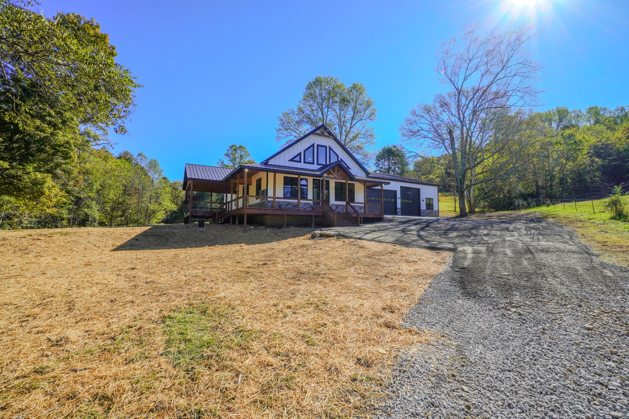 5109 Union Camp Road Lafayette, TN 37083 - Photo 3 of 36 a house view with a garden space