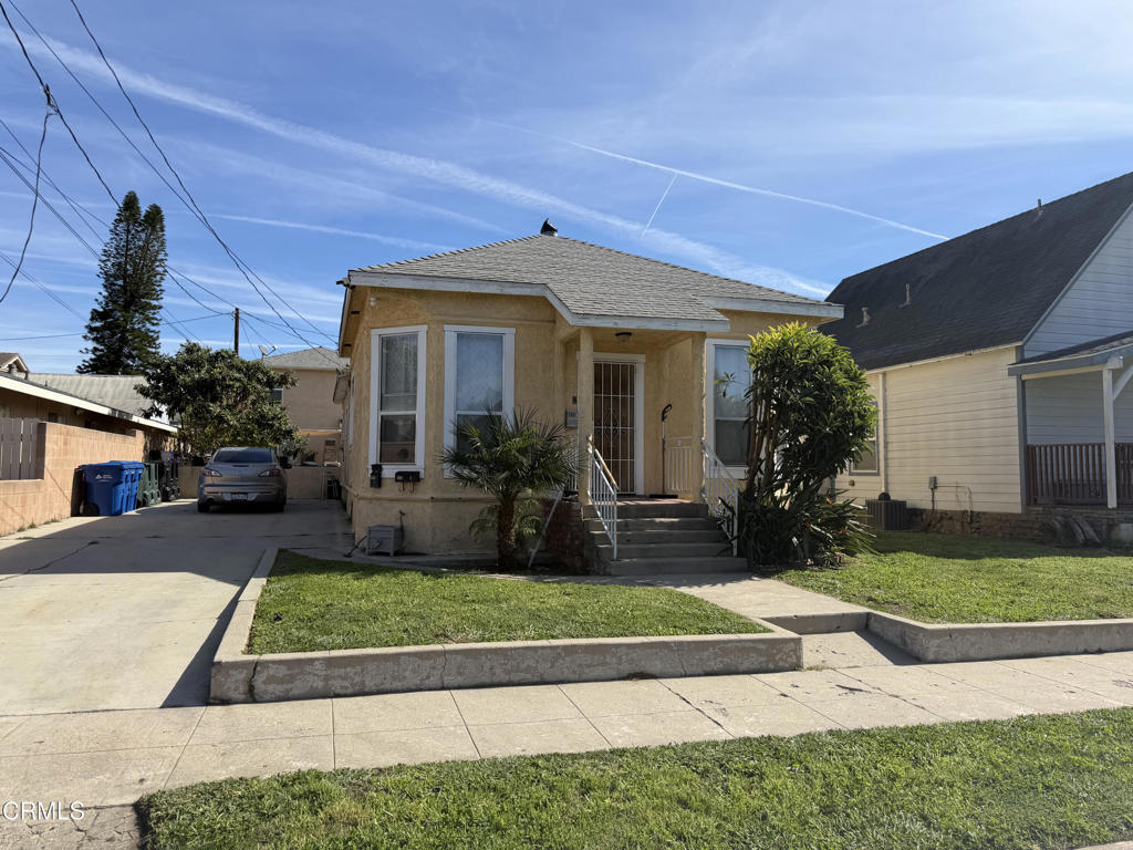 321 Walnut Street Santa Paula, CA 93060 - Photo 1 of 4 a view of a house with a yard