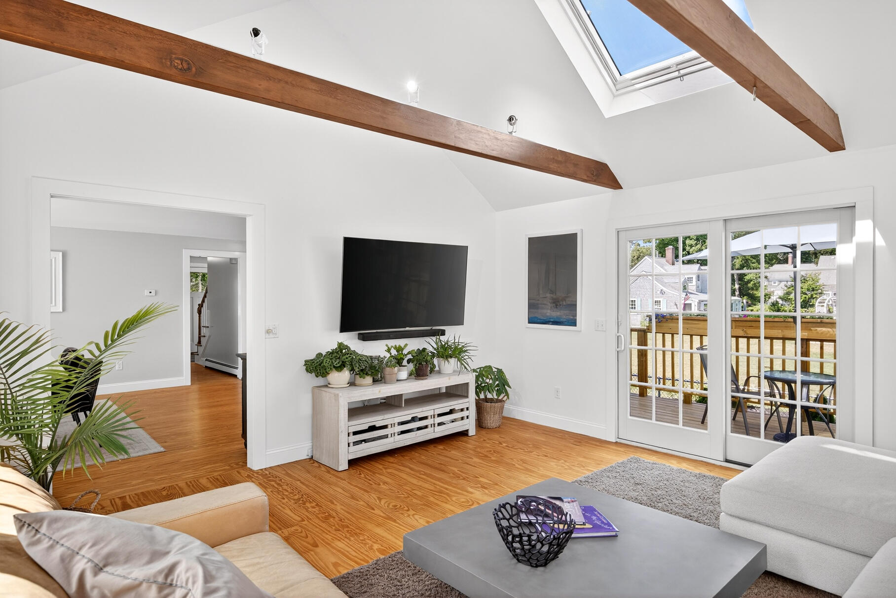 5 Canary Street Sandwich, MA 02563 - Photo 18 of 45 a living room with furniture and a flat screen tv