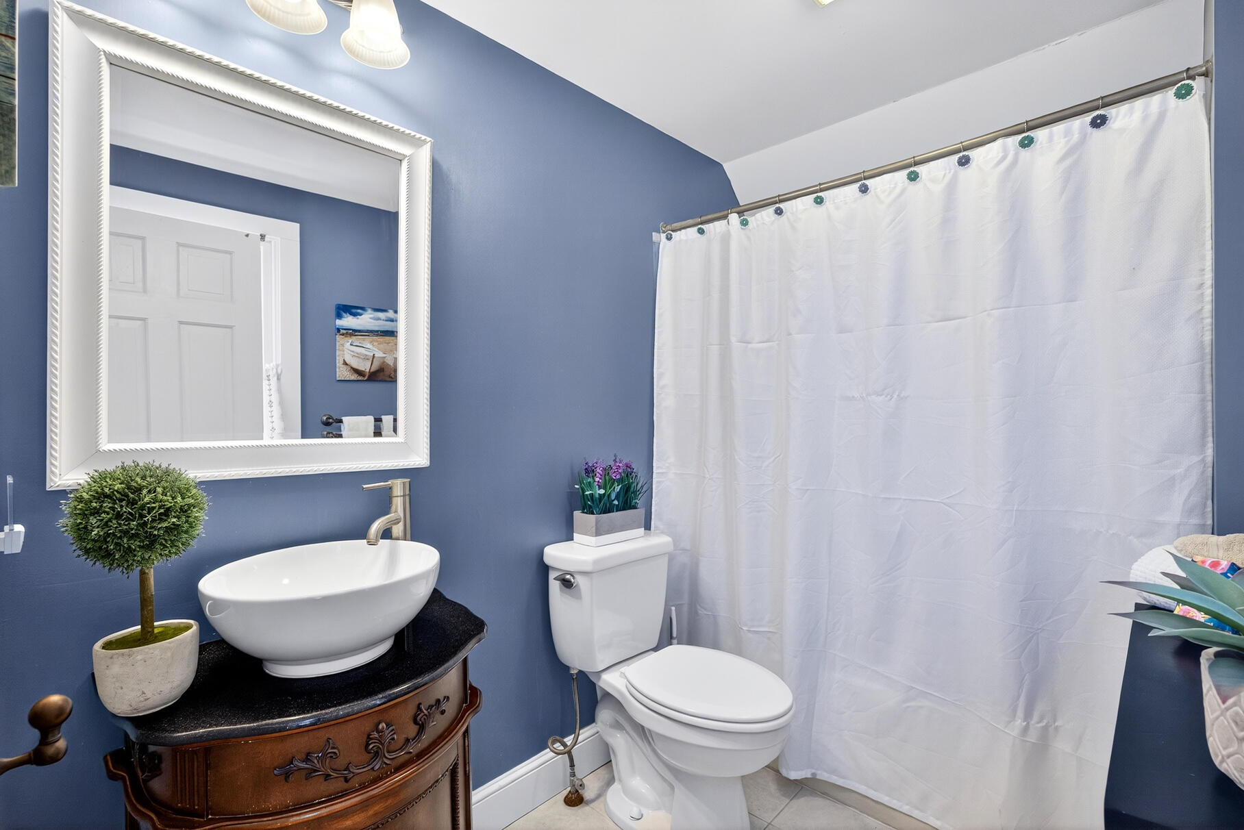5 Canary Street Sandwich, MA 02563 - Photo 32 of 45 a bathroom with a toilet sink and mirror