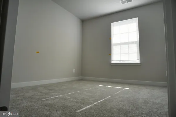 a view of empty room with window