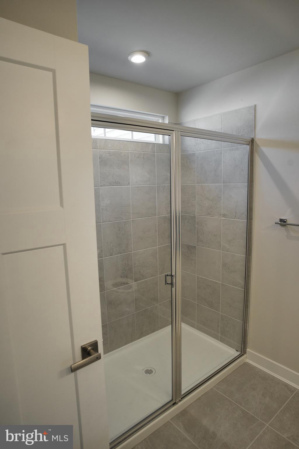 549 Lewes Landing Road Middletown, DE 19709 - Photo 16 of 19 a bathroom with a shower