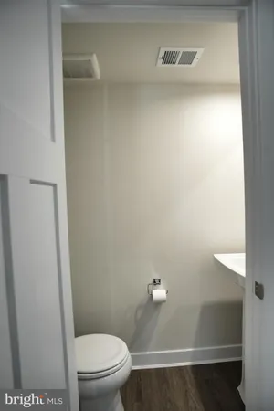 a bathroom with a sink and toilet