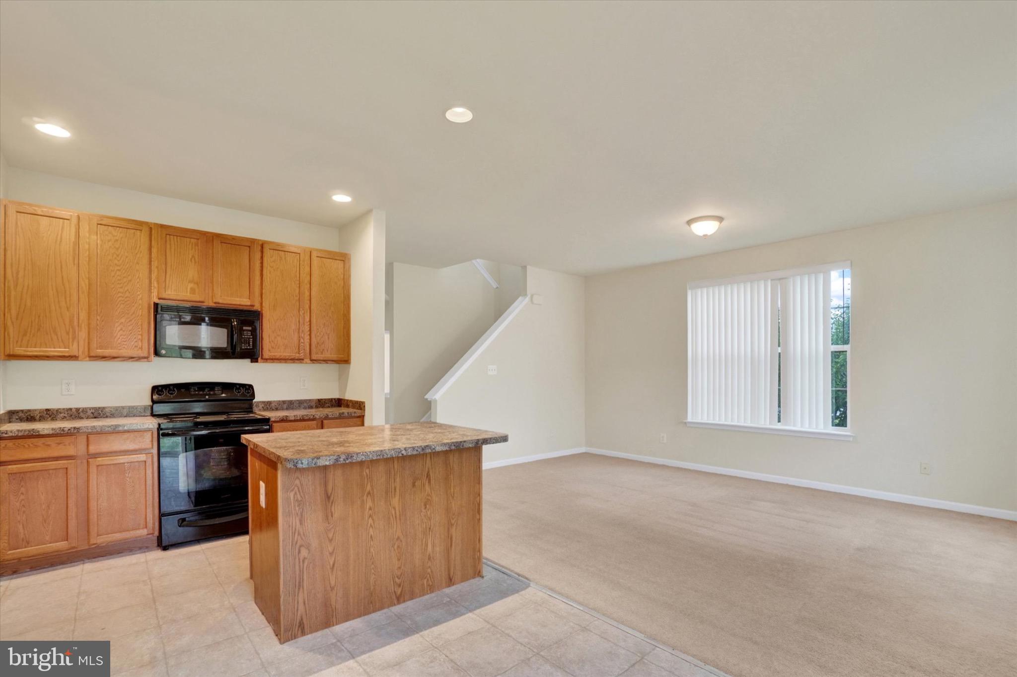 2450 Walnut Bottom Road, Unit 85 York, PA 17408 - Photo 7 of 29 Spacious open-concept living area.