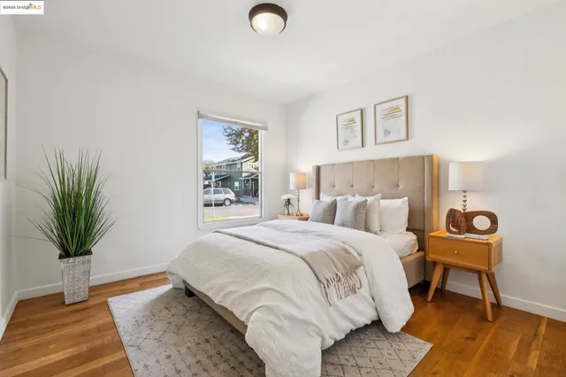 a bathroom with a sink a toilet a shower and a mirror