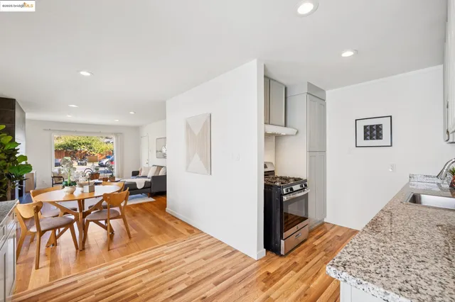a view of a chairs and table in the balcony