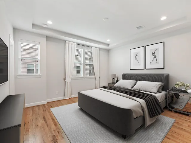 a table and chair in a small room