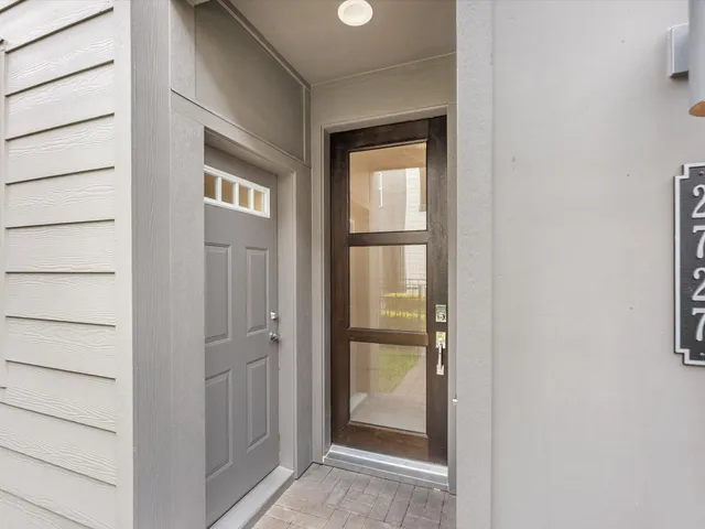 a view of entryway with wooden floor