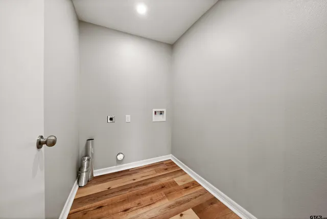 a house with a large tree in front of it