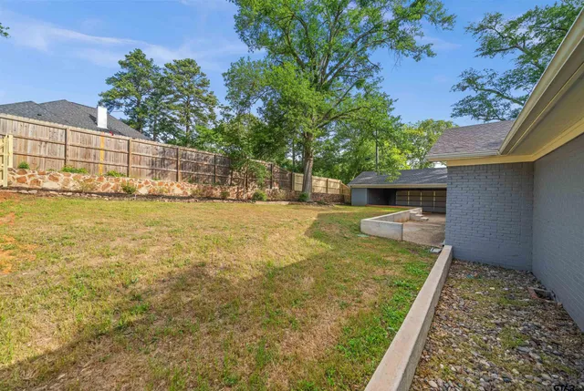 a house with trees in front of it