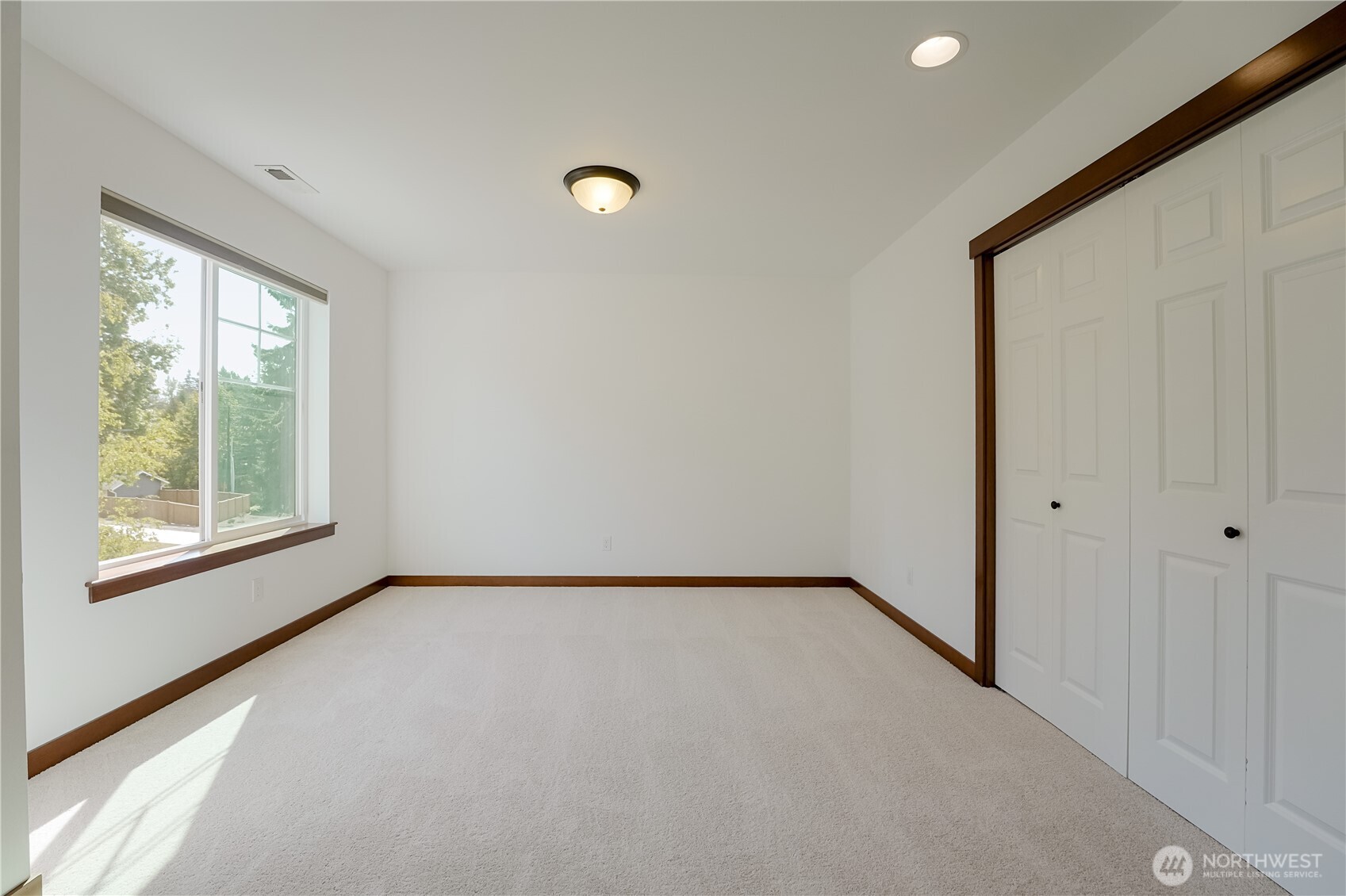 607 217th Street Southwest Bothell, WA 98021 - Photo 23 of 36 a view of an empty room with a window