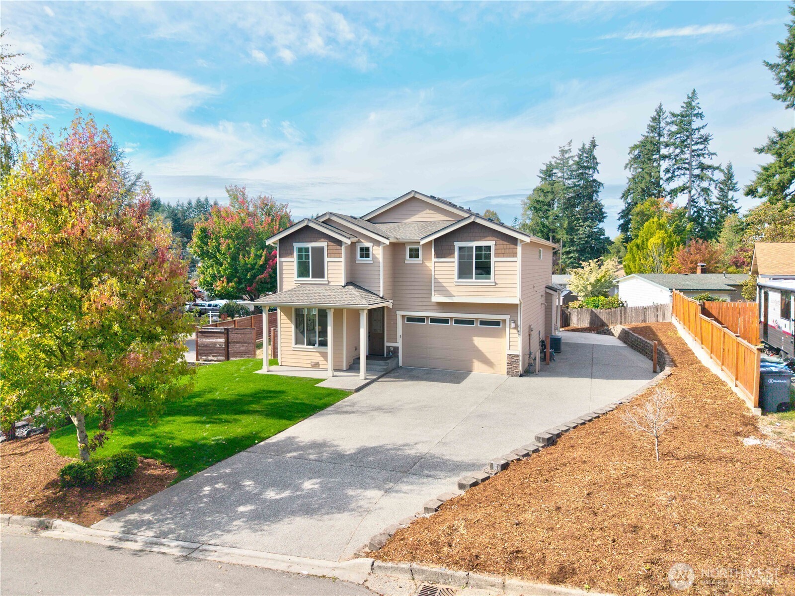 607 217th Street Southwest Bothell, WA 98021 - Photo 3 of 36 a view of a house with a patio