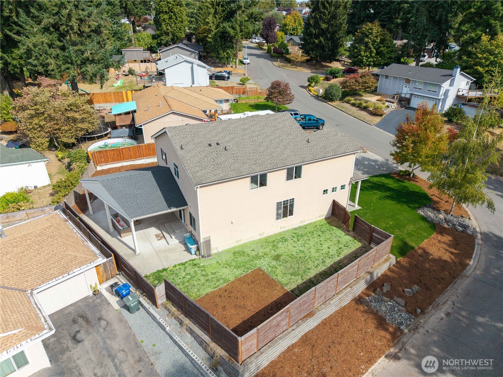 607 217th Street Southwest Bothell, WA 98021 - Photo 36 of 36 an aerial view of a house with garden space and street view